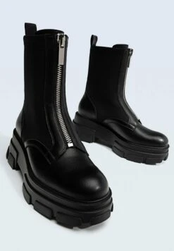 Stradivarius FLACHE MIT REISSVERSCHLUSS UND PROFIL - Stiefelette - Black -Stradivarius Deutschland Verkaufs-Shop 6e736a74082a46e98abadb15690e7612