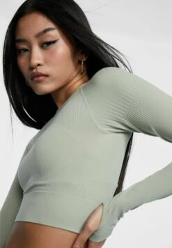 Stradivarius SEAMLESS TEXTURED WITH RAGLAN SLEEVES - Langarmshirt - Khaki 9 Stradivarius SEAMLESS TEXTURED WITH RAGLAN SLEEVES - Langarmshirt - Khaki -Stradivarius Deutschland Verkaufs-Shop 8a2fc76b13b946a9aff5122067cf9f39